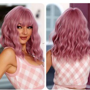 Pink curly synthetic wig with bangs